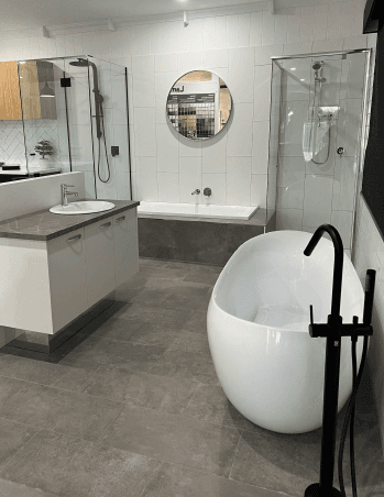Bathroom selections display highlighting tile, vanity and fixture combinations.