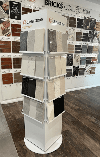 Selection workspace with cabinetry, tile and benchtop samples laid out together.